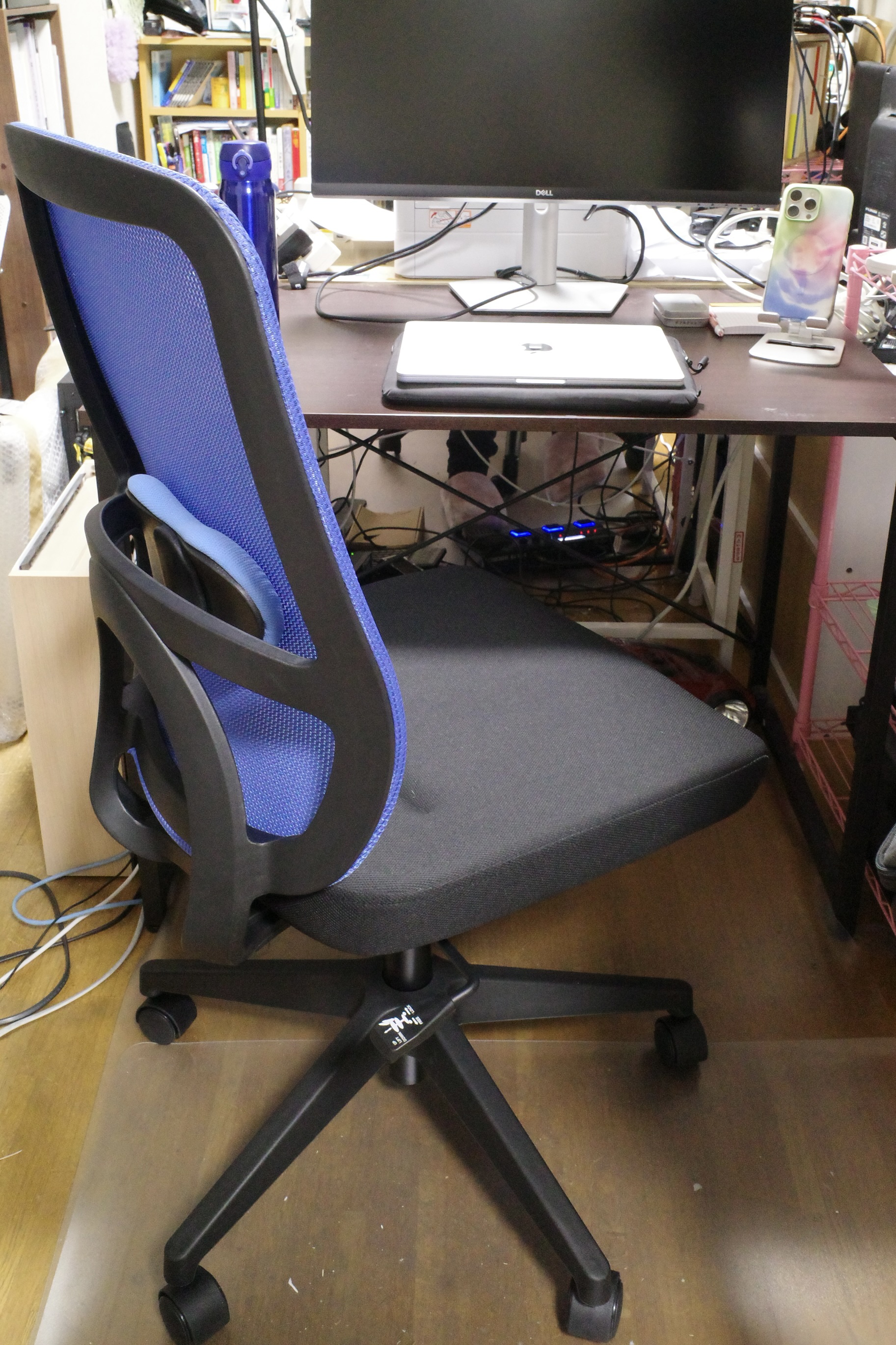 An office chair with blue back