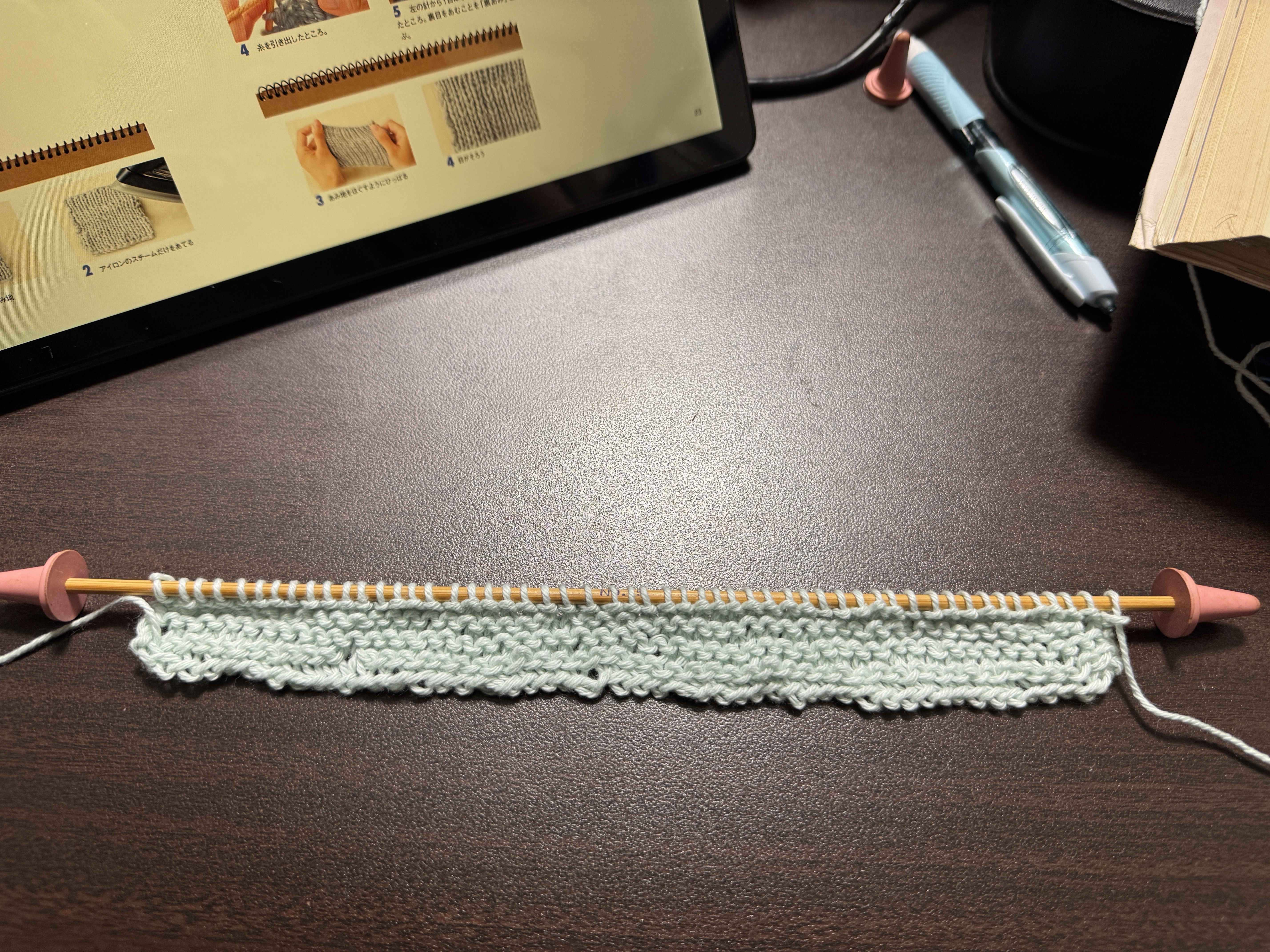 An image of garter stitch with pale blue cotton yarn