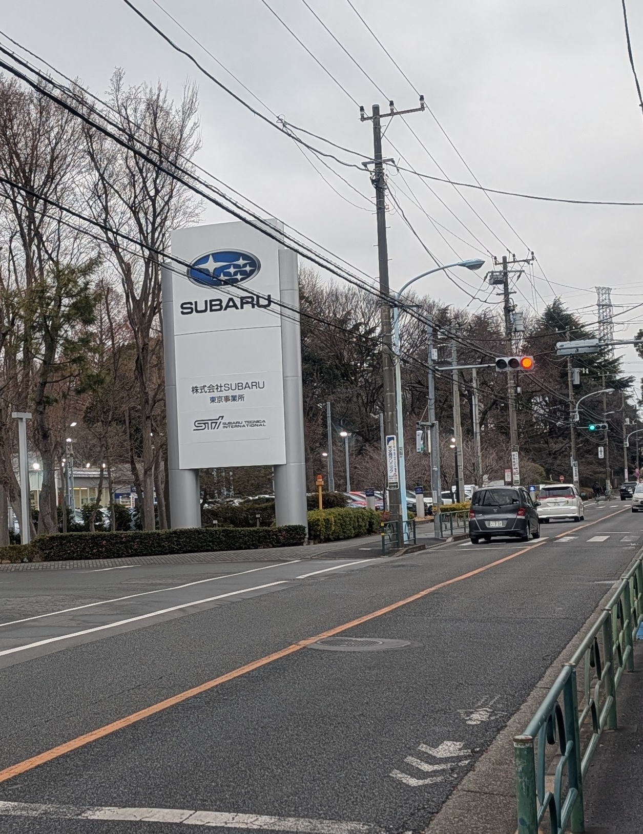 An image of SUBARU board on a road