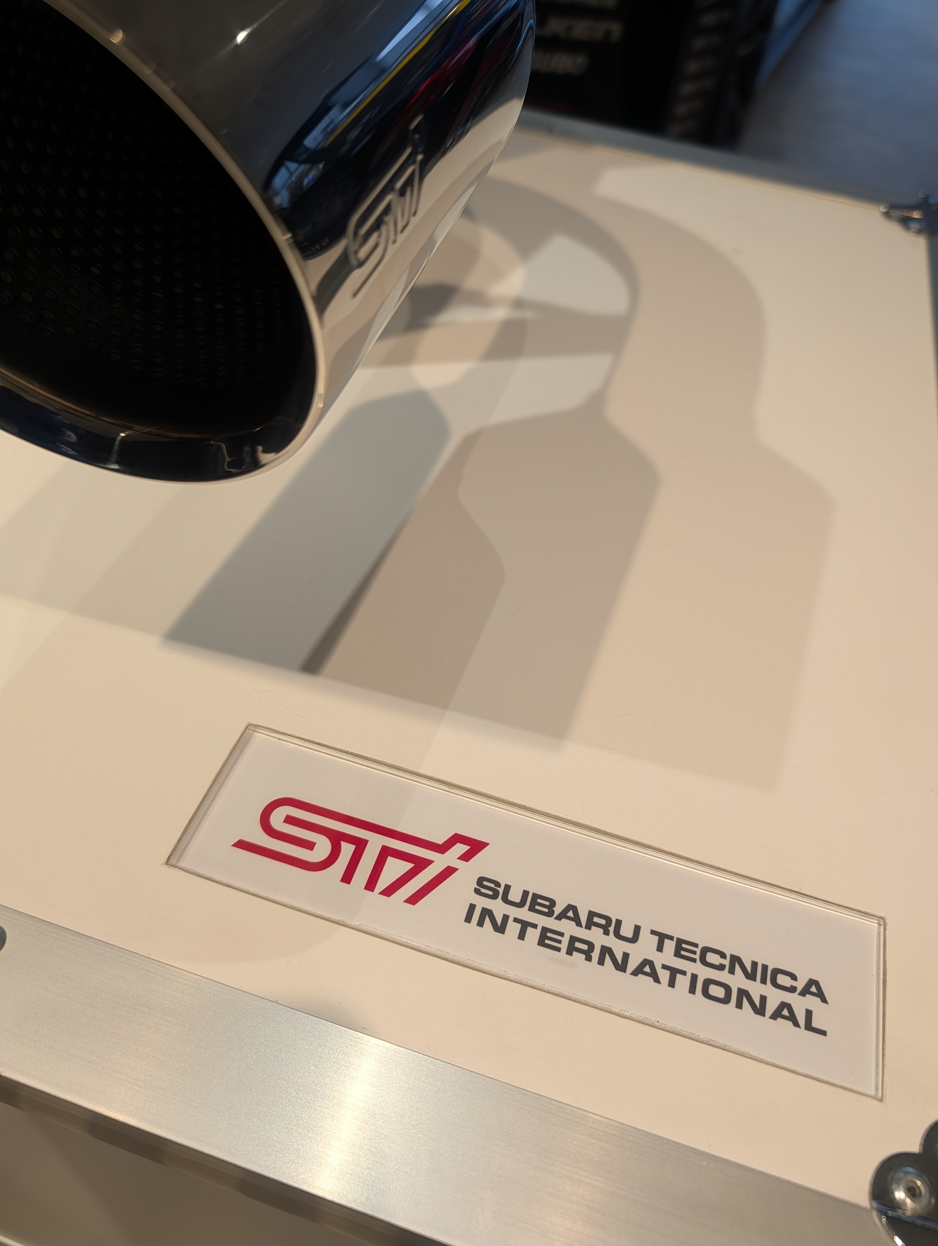 An image of an STI logo sign